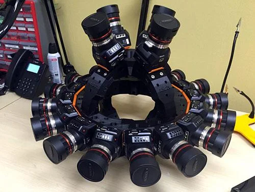 BB360 array of Blackmagic cameras on a workbench.