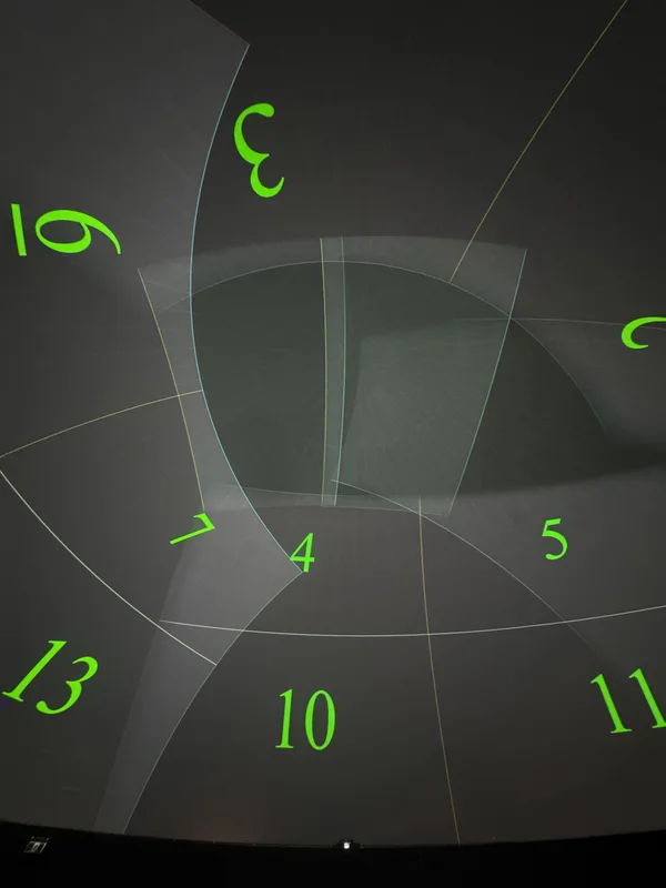 Dome screen showing numbered projector fields and calibration geometry.