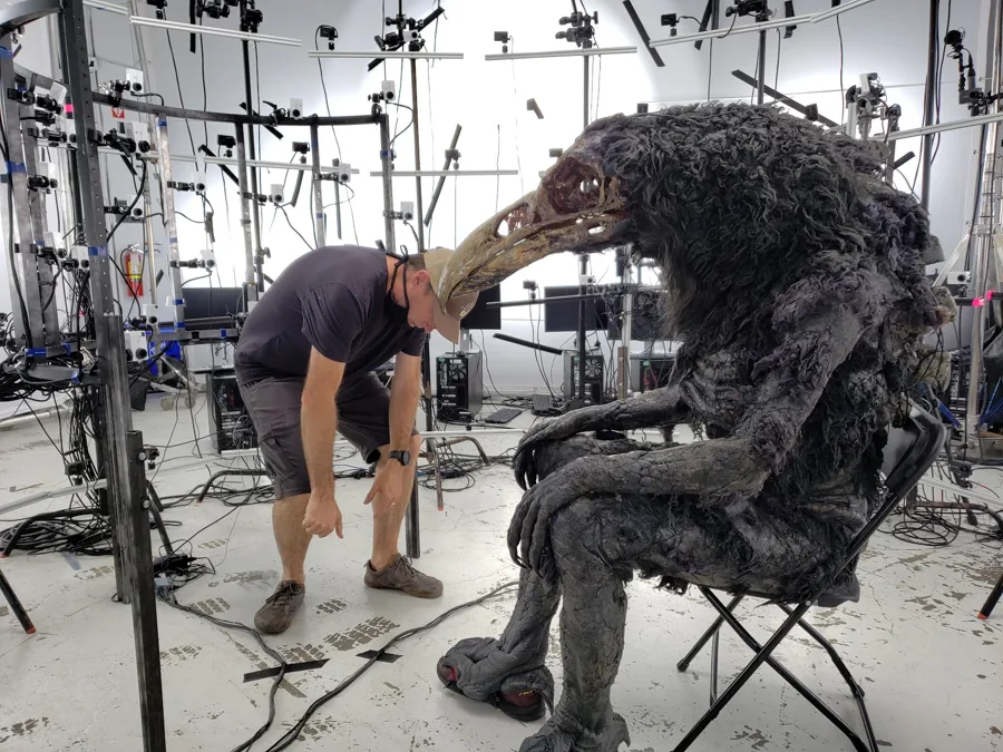 Practical creature and operator inside the portable volumetric capture stage.