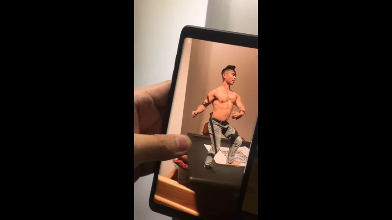 Captured dance performance displayed on a mobile device.