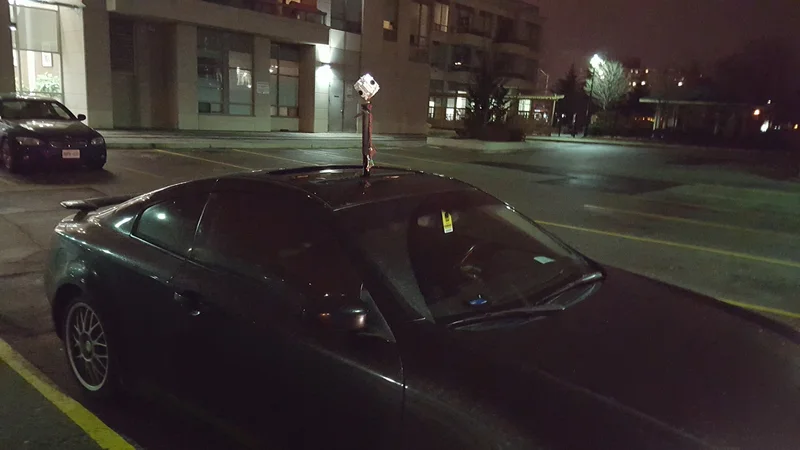 Nightcrawler — Nightcrawler camera mounted on a car roof at night.