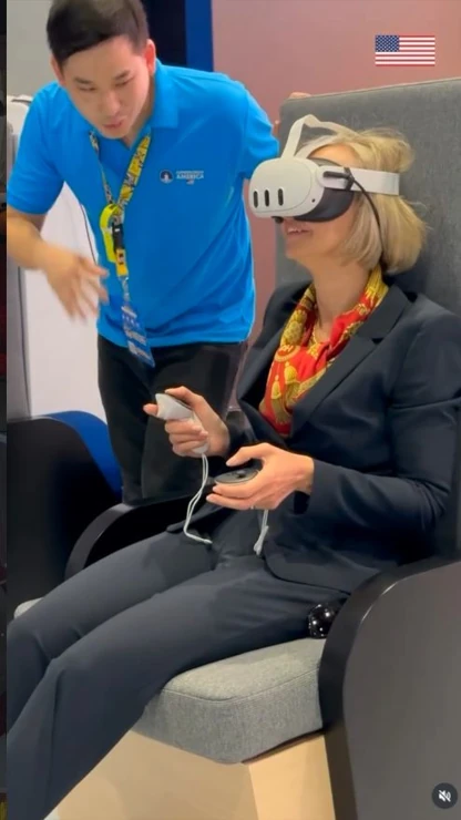 A SuperMuseum headset demonstration with the exhibition team — video frame. Source: U.S. Mission UAE.
