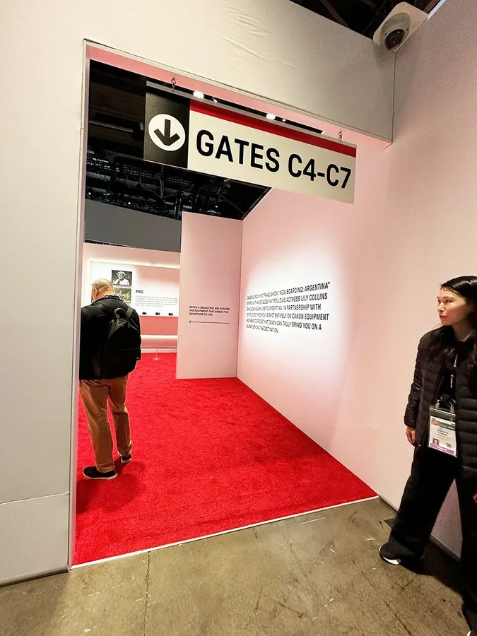 Airport-gate wayfinding corridor at Canon’s CES 2024 booth.