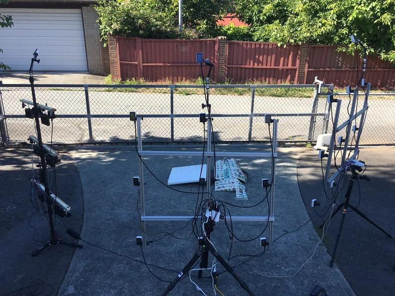 Early portable square camera array assembled outdoors.